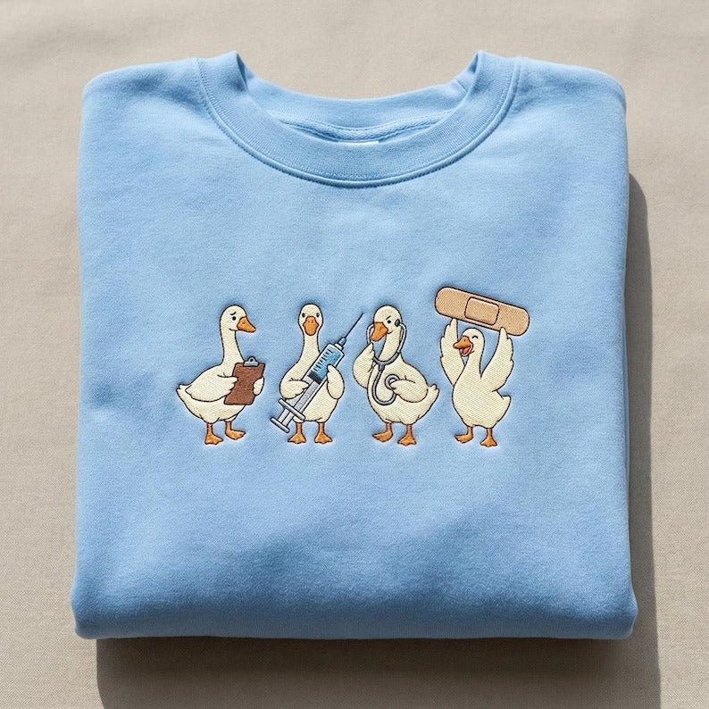 Nurse Duck Embroidered Sweatshirt, Medical Duck Parade, Funny Nurse Humor, Healthcare Worker Crewneck