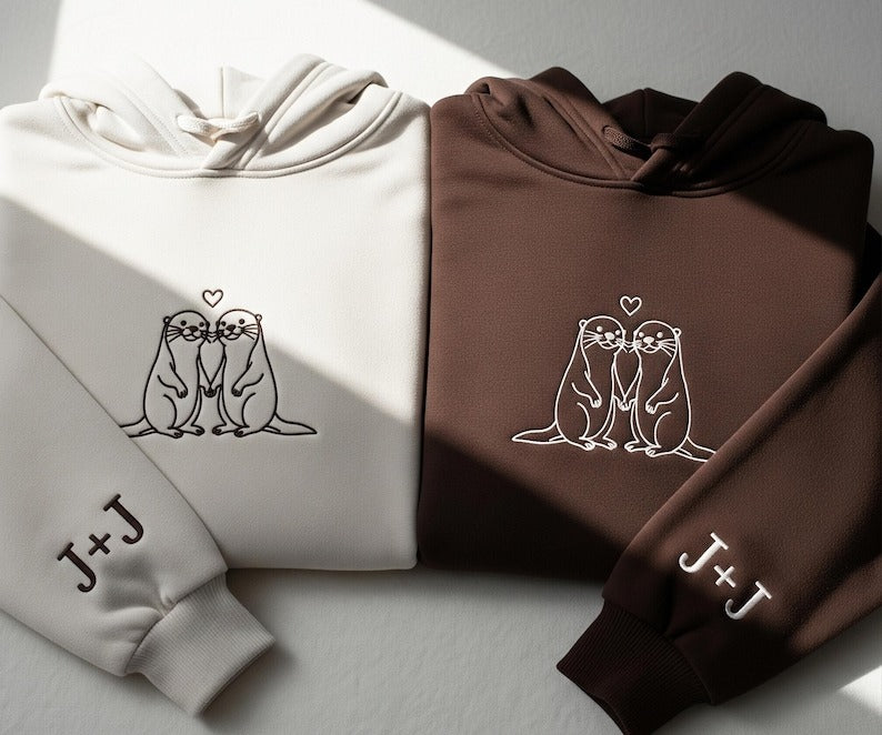 Embroidered Otter Love Matching Couple Hoodie With Personalized Sleeve Initials - Cute Anniversary Sweatshirt Gift For Him And Her