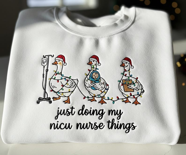 NICU Nurse Christmas Sweatshirt with Funny Duck Embroidery and Holiday Lights