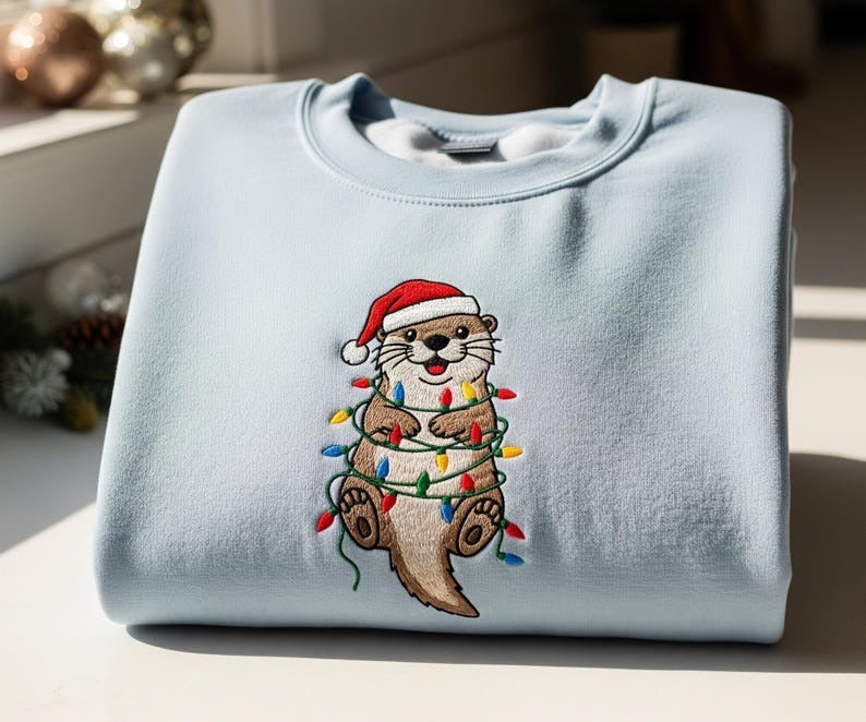 Christmas Otter Embroidered Sweatshirt – Holiday Lights Animal Crewneck