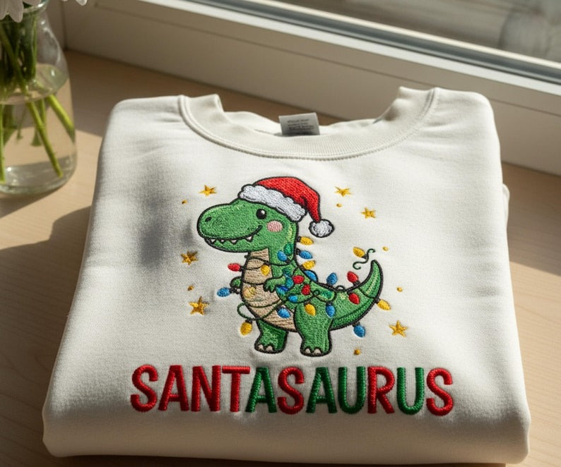 Embroidered Dinosaur Christmas Sweatshirt, Santasaurus Holiday Crewneck, Funny Xmas Embroidered Gift
